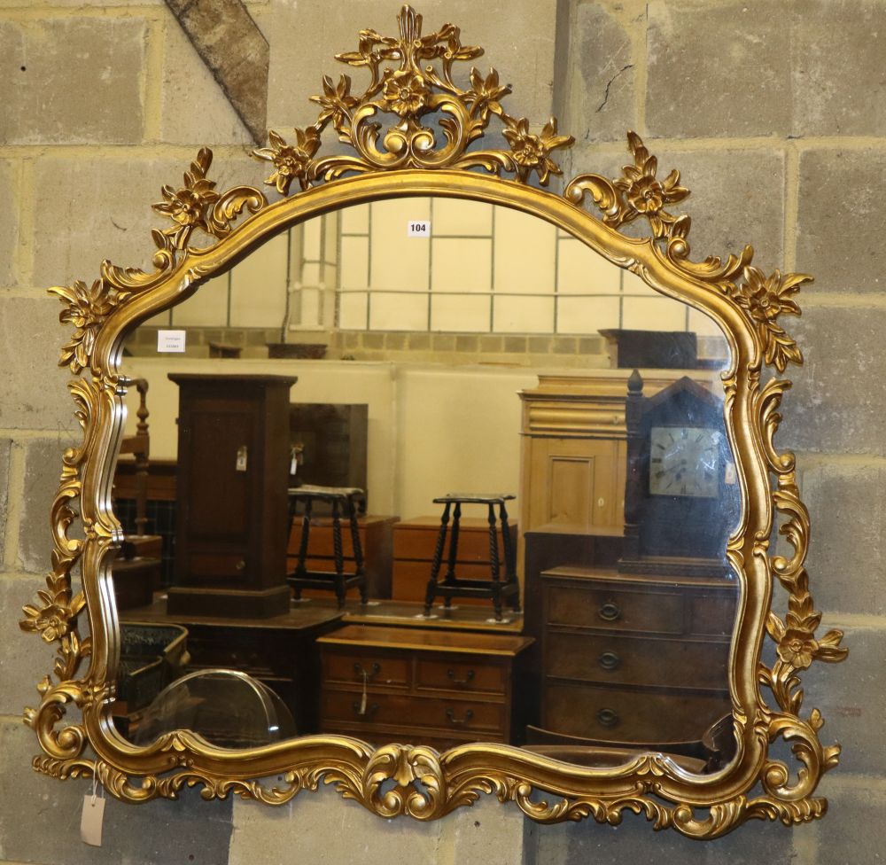 A reproduction gilt framed overmantel mirror, W.112cm, H.114cm